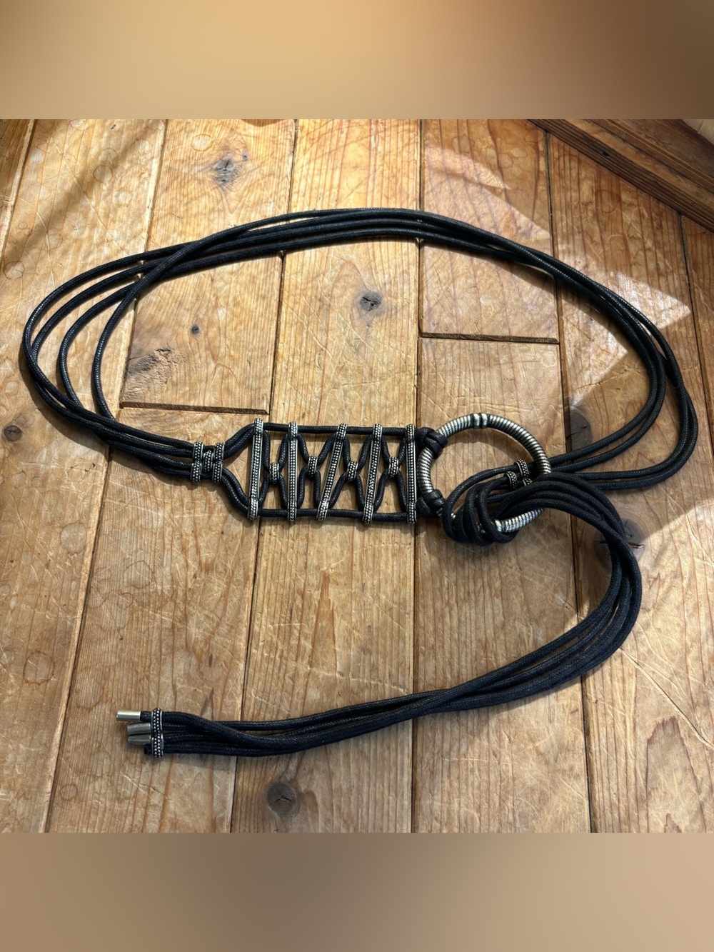 Black Tassel and Silver Belt